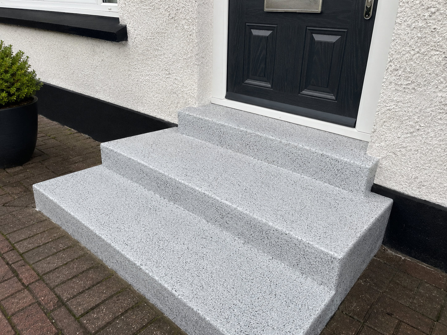 Spray granite exterior surface Manchester