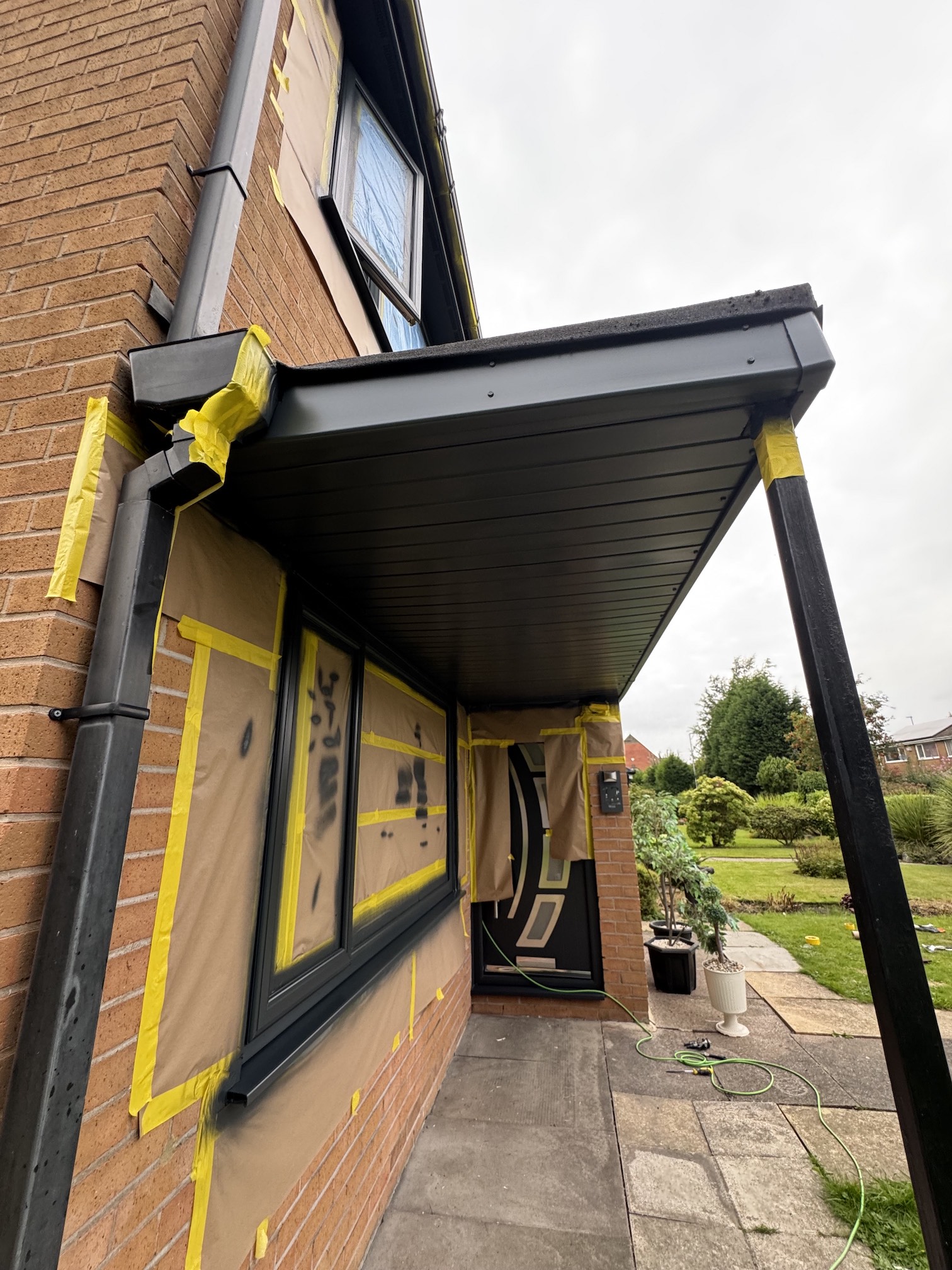 After: UPVC garage door sprayed black