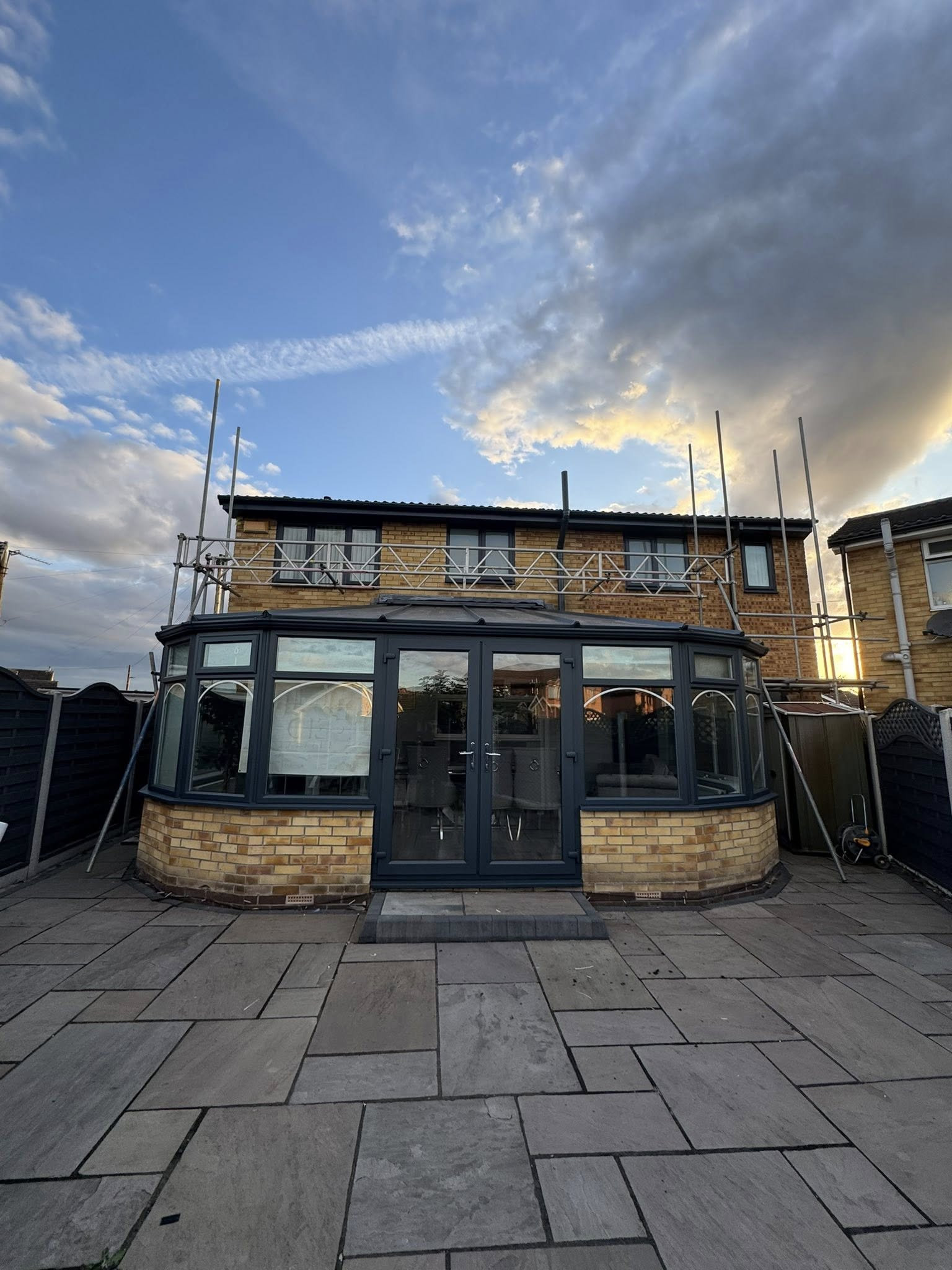 After: conservatory UPVC frames sprayed grey
