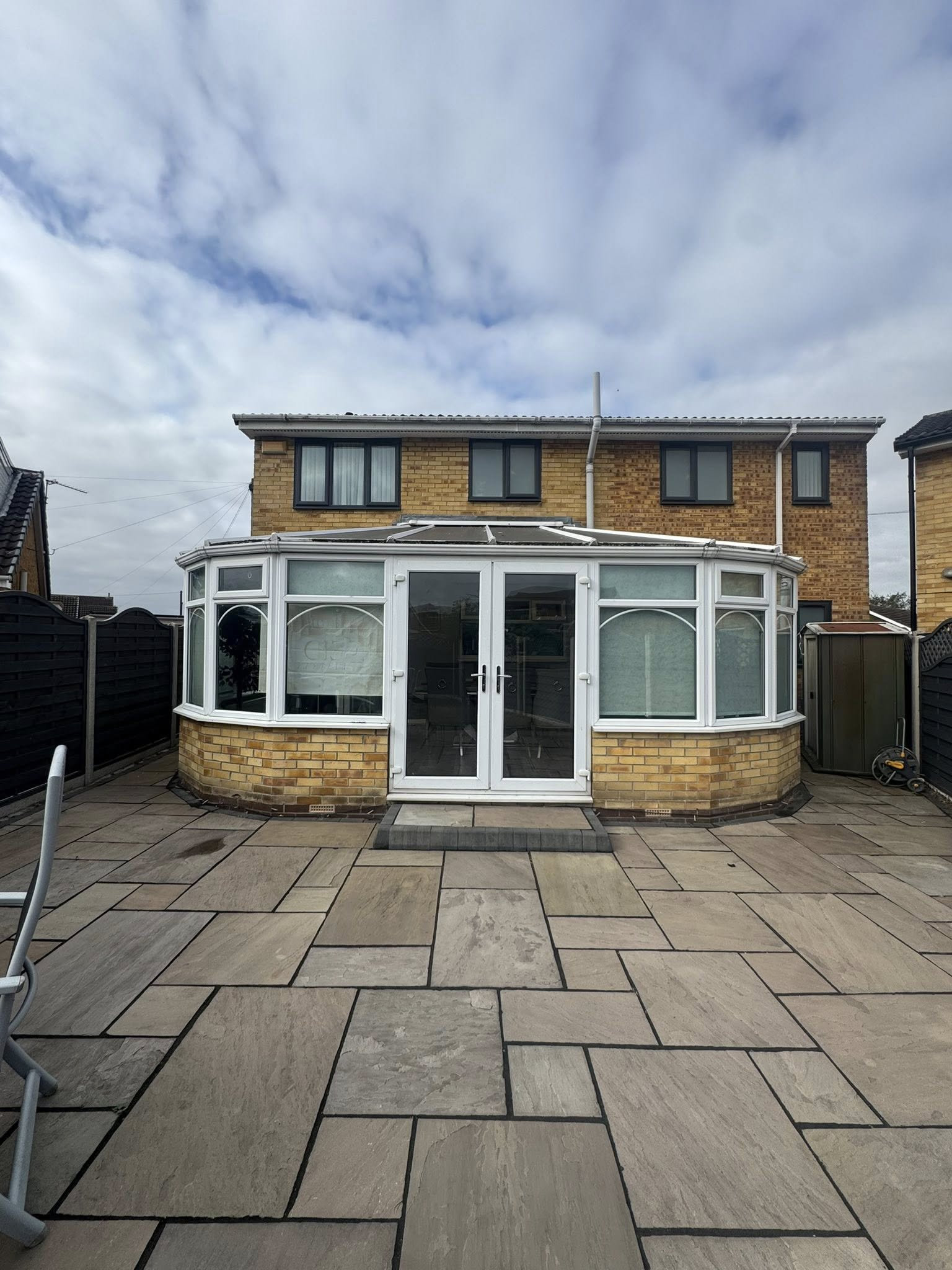 Before: white UPVC conservatory frames