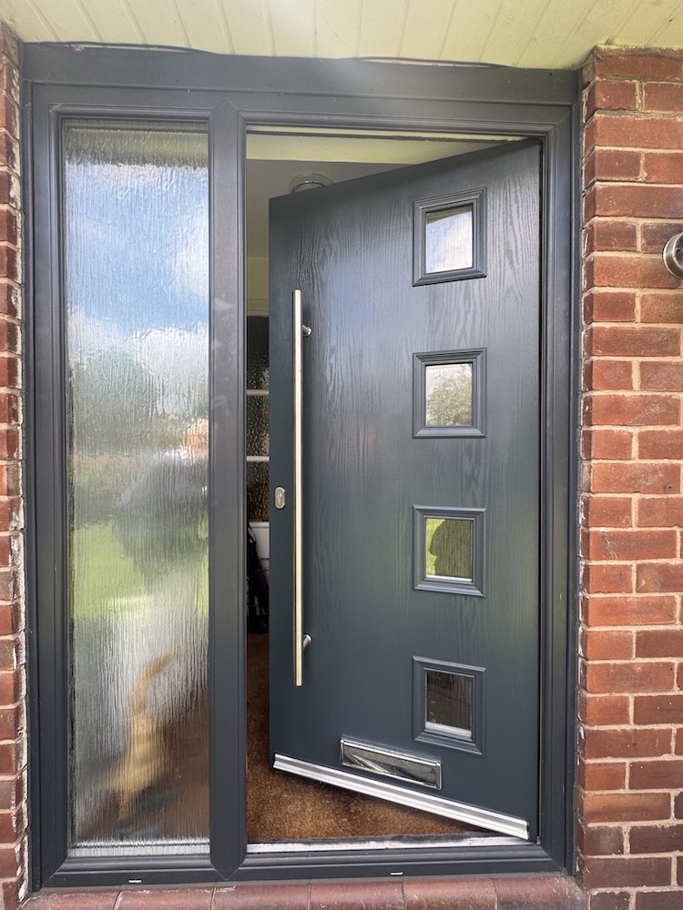 After: UPVC front door sprayed anthracite grey